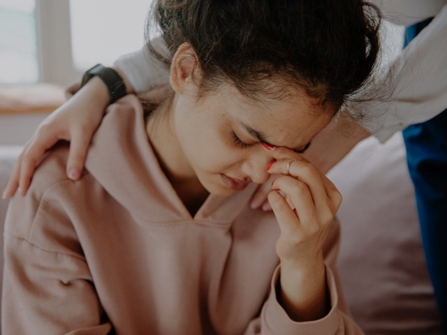 a girl who looks distress